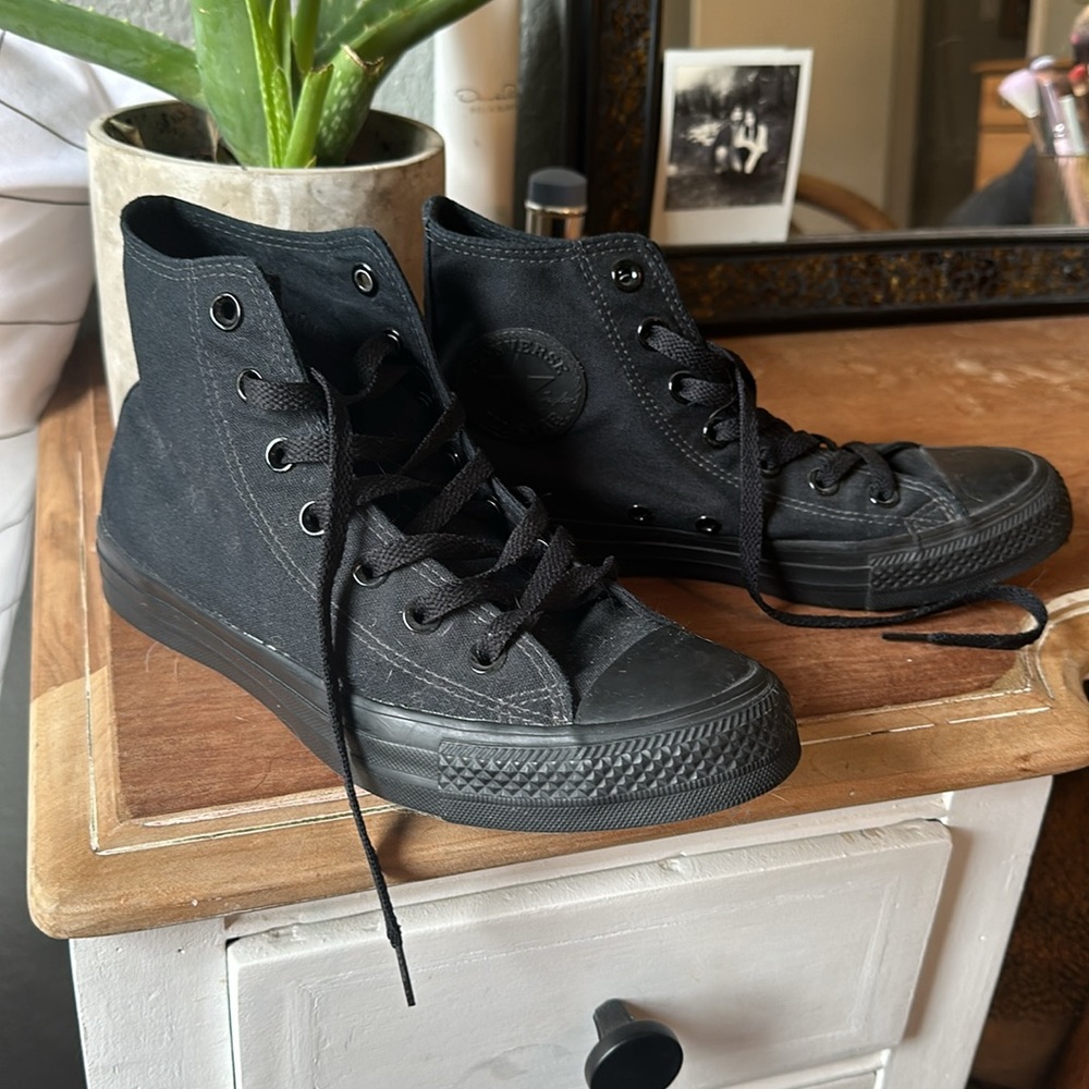 All black high top Converse